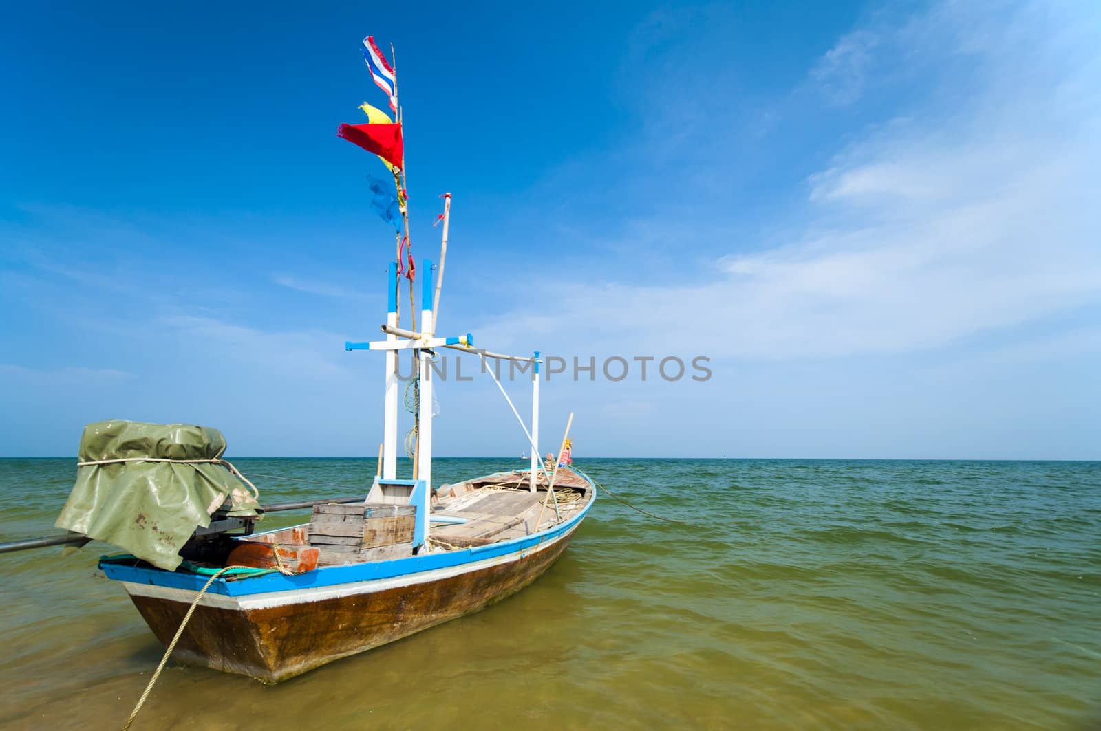 Boat docking at the beach  by TanawatPontchour