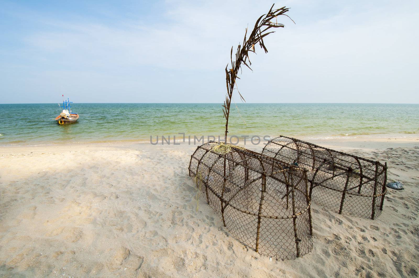 fish traps on the beach in thailand