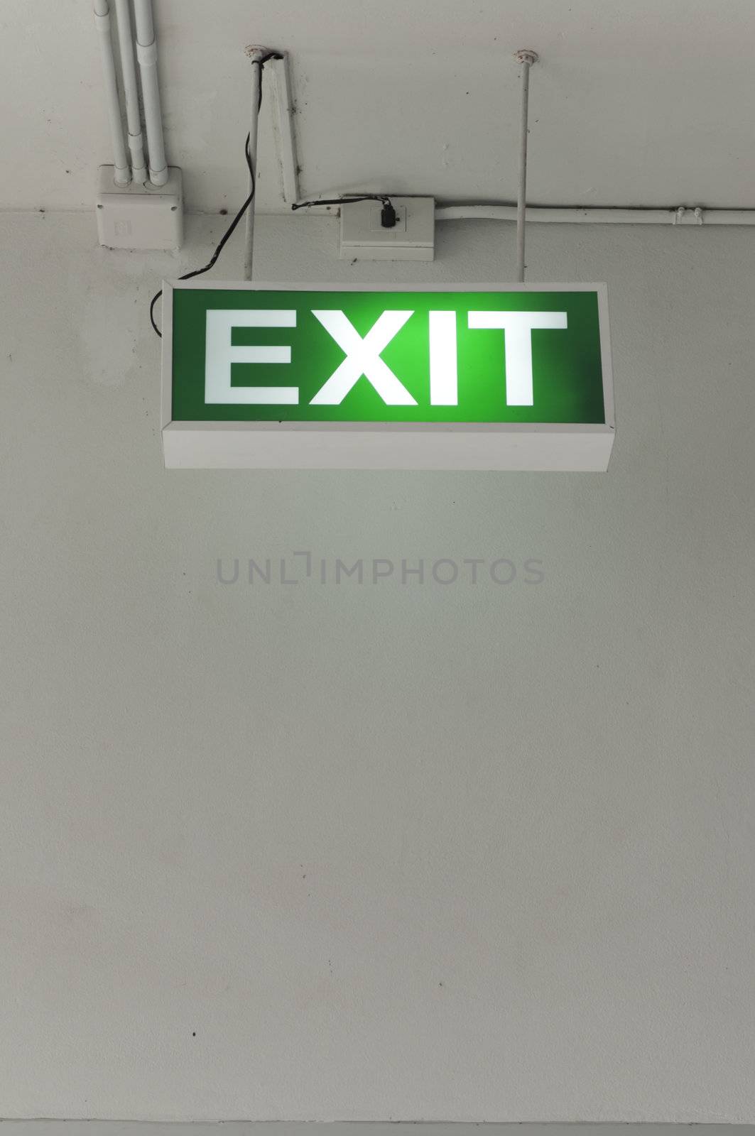 Emergency exit sign by TanawatPontchour