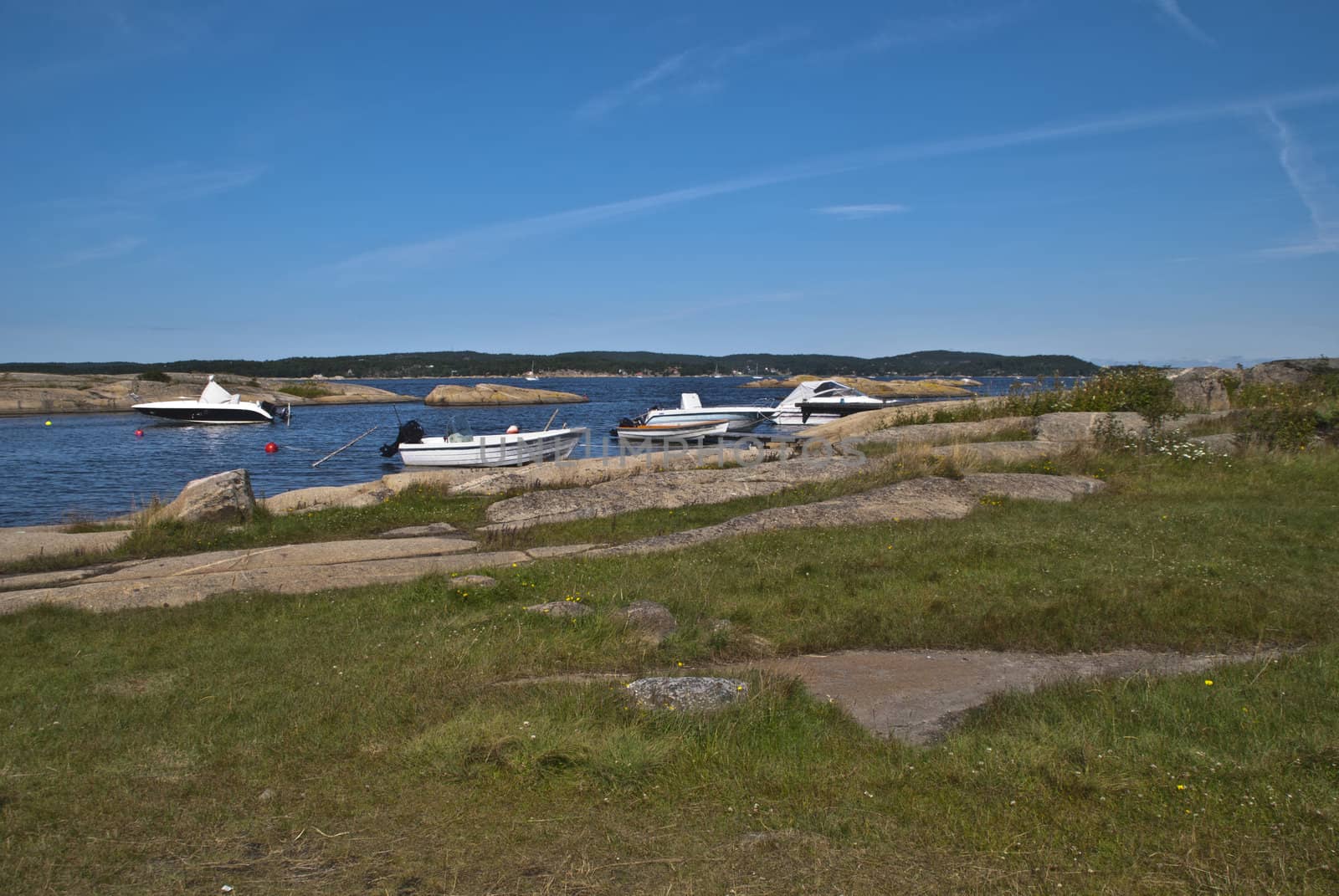 at the end of grims island in skjeberg in sarpsborg municipality, norway is the great recreational area dusa, in summer this is a popular destination for the local population.