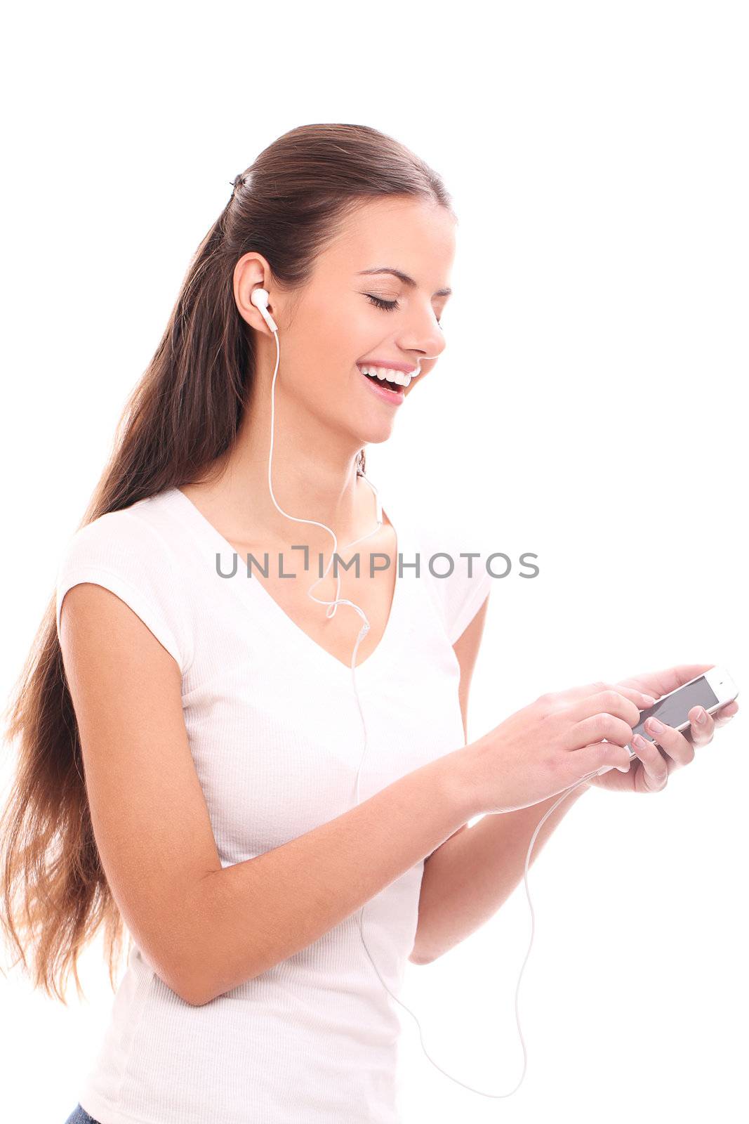 Attractive woman listen music with headphones isolated on a white