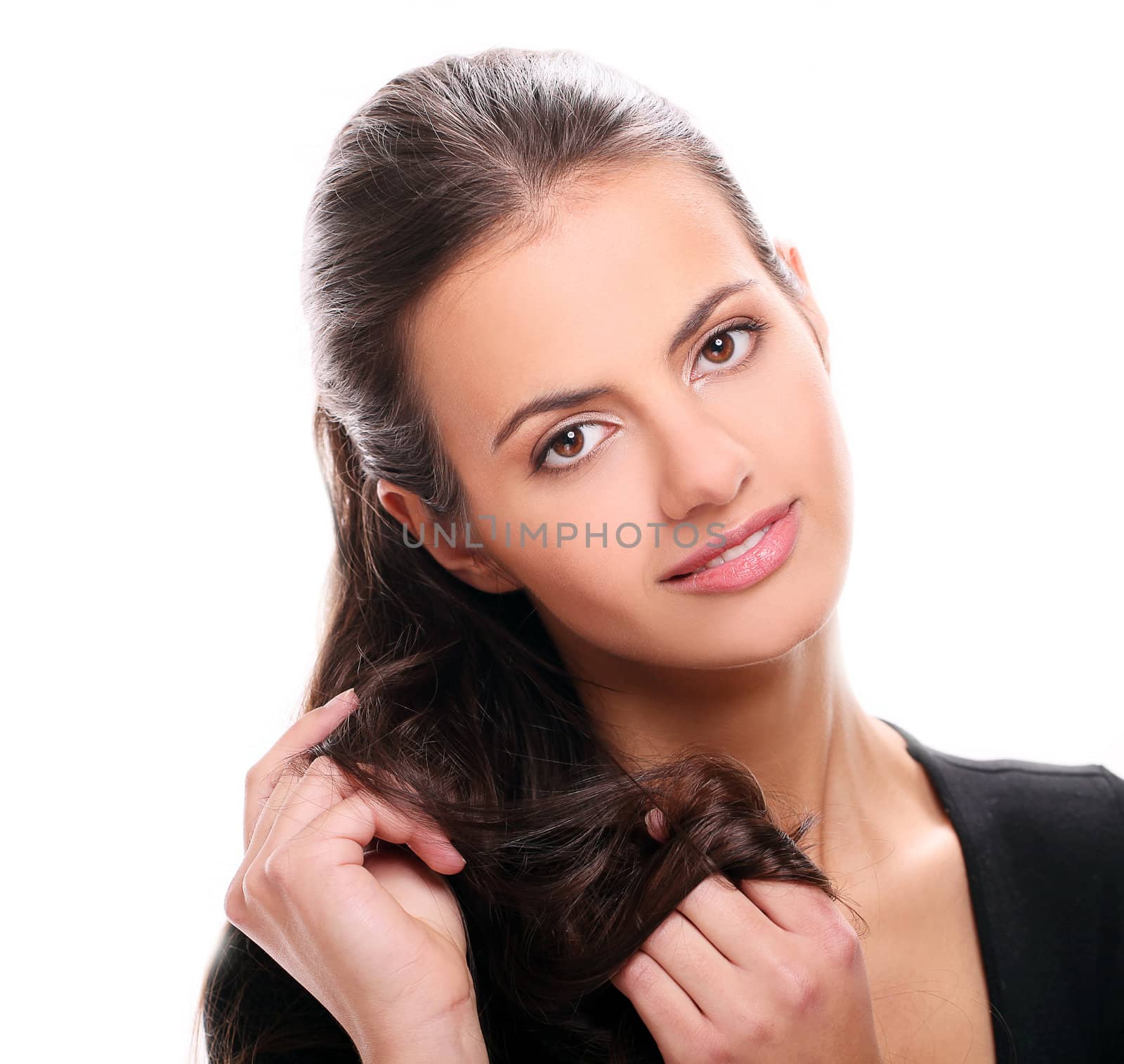 Portrait of Attractive smiling woman touching her hair