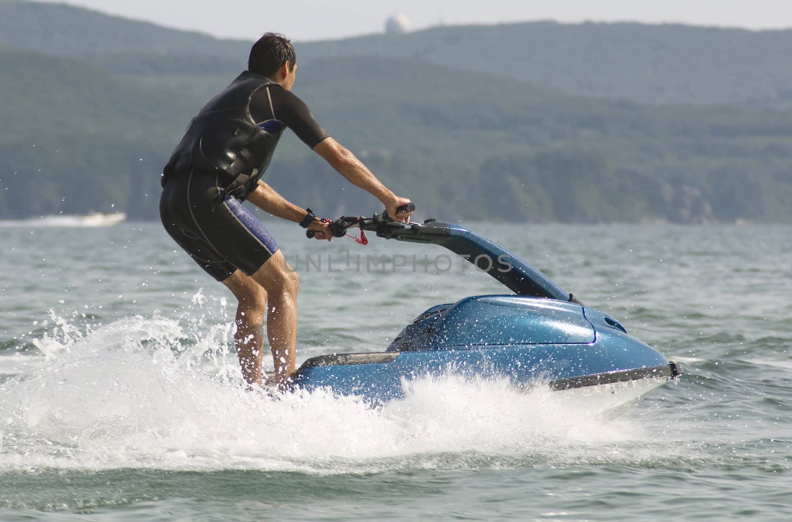 man riding a jet ski in the Japan Sea