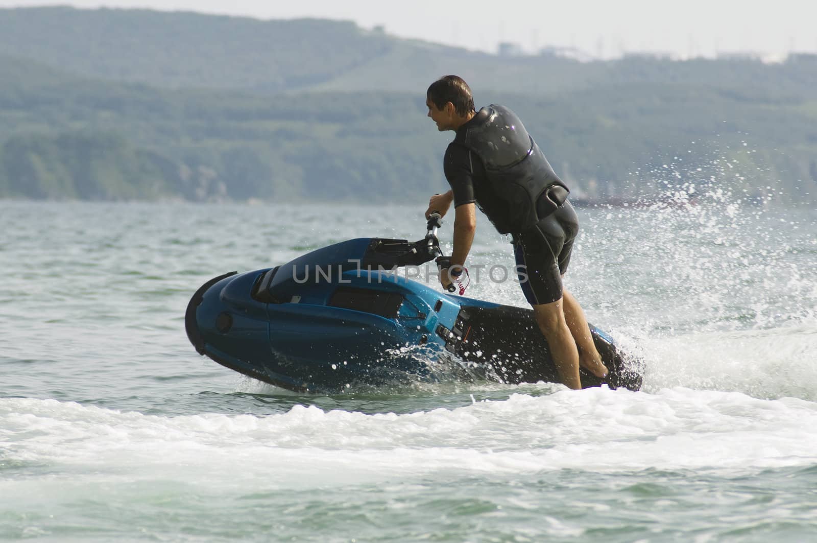 man riding a jet ski in the Japan Sea