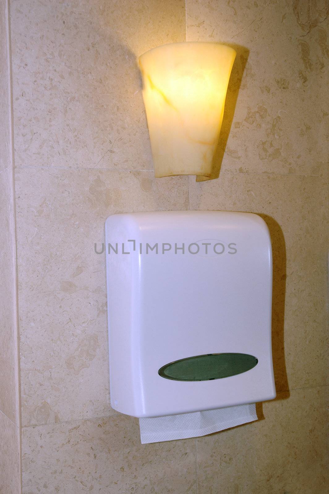 tissue box on the wall at washroom by antonihalim