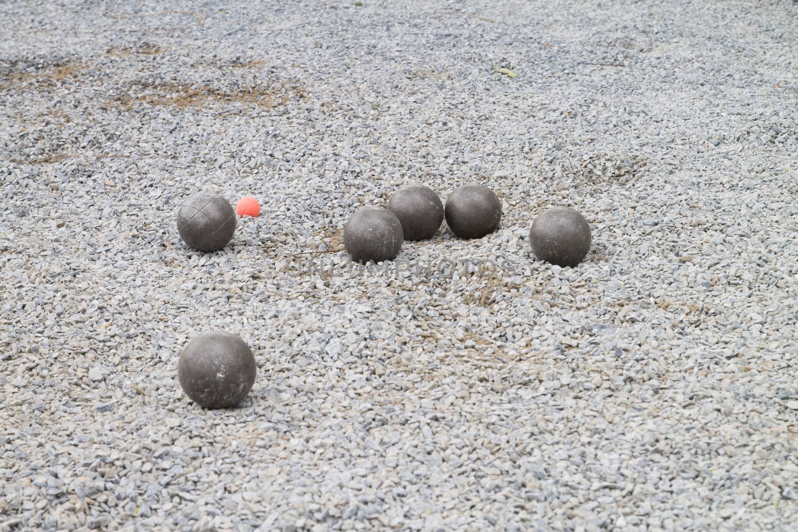 Playing Petanque with cochonnet orange color