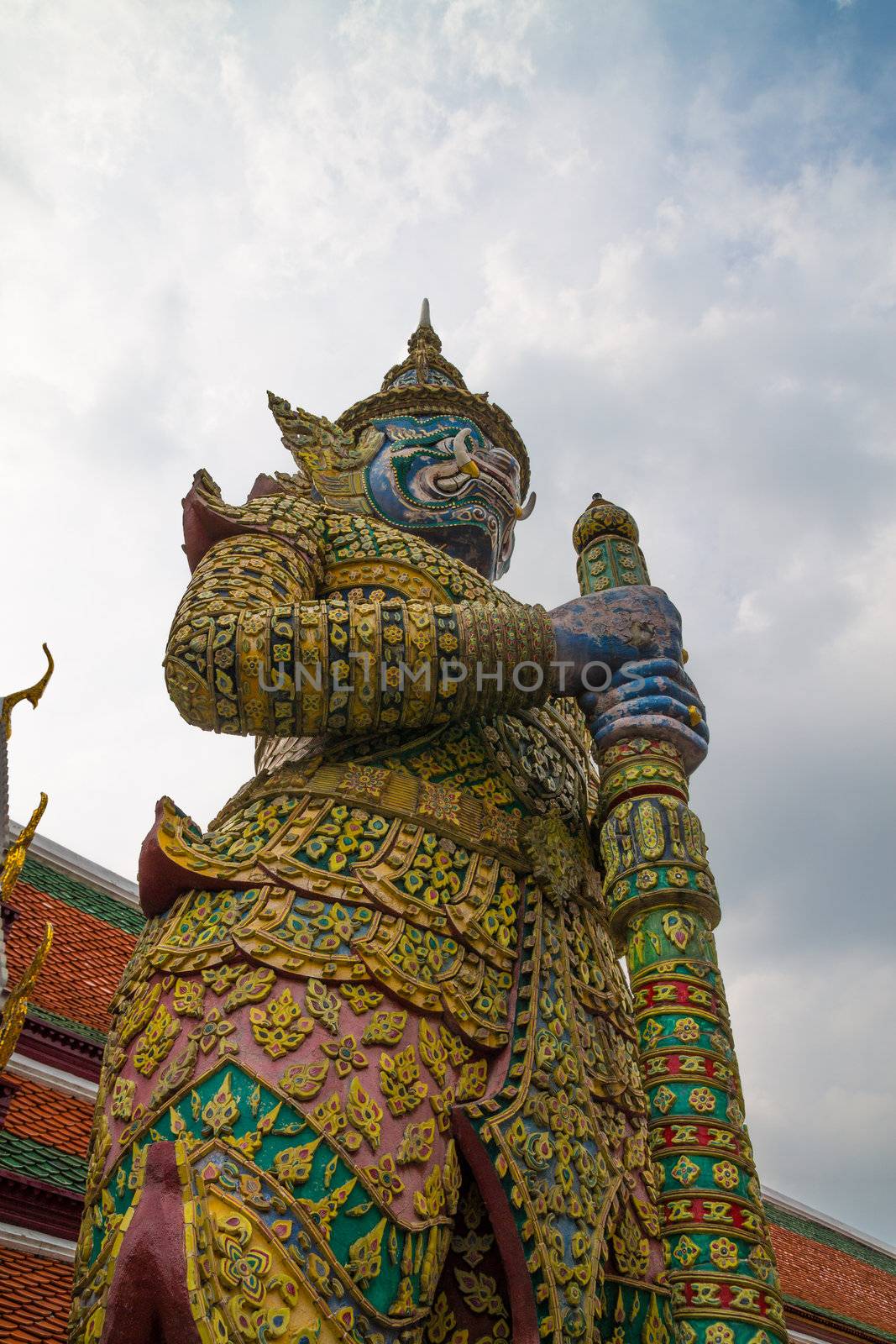 Famous statue of a giant guard taken at the Grand Palace in Bangkok, Thailand.