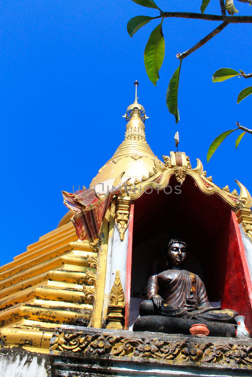 copper statue of a Buddha in Thailand.
