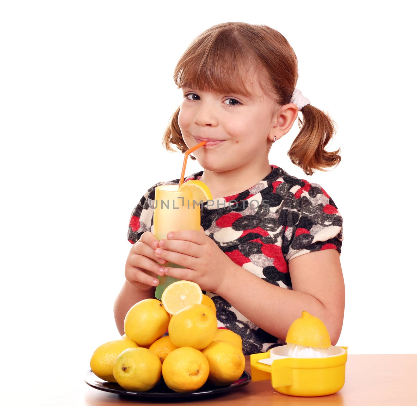little girl drink lemonade