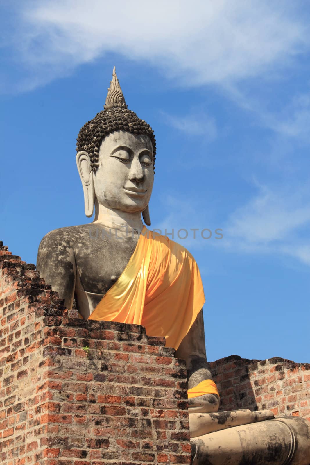 Ancient buddha statue with blue sky, Ayutthaya, Thailand