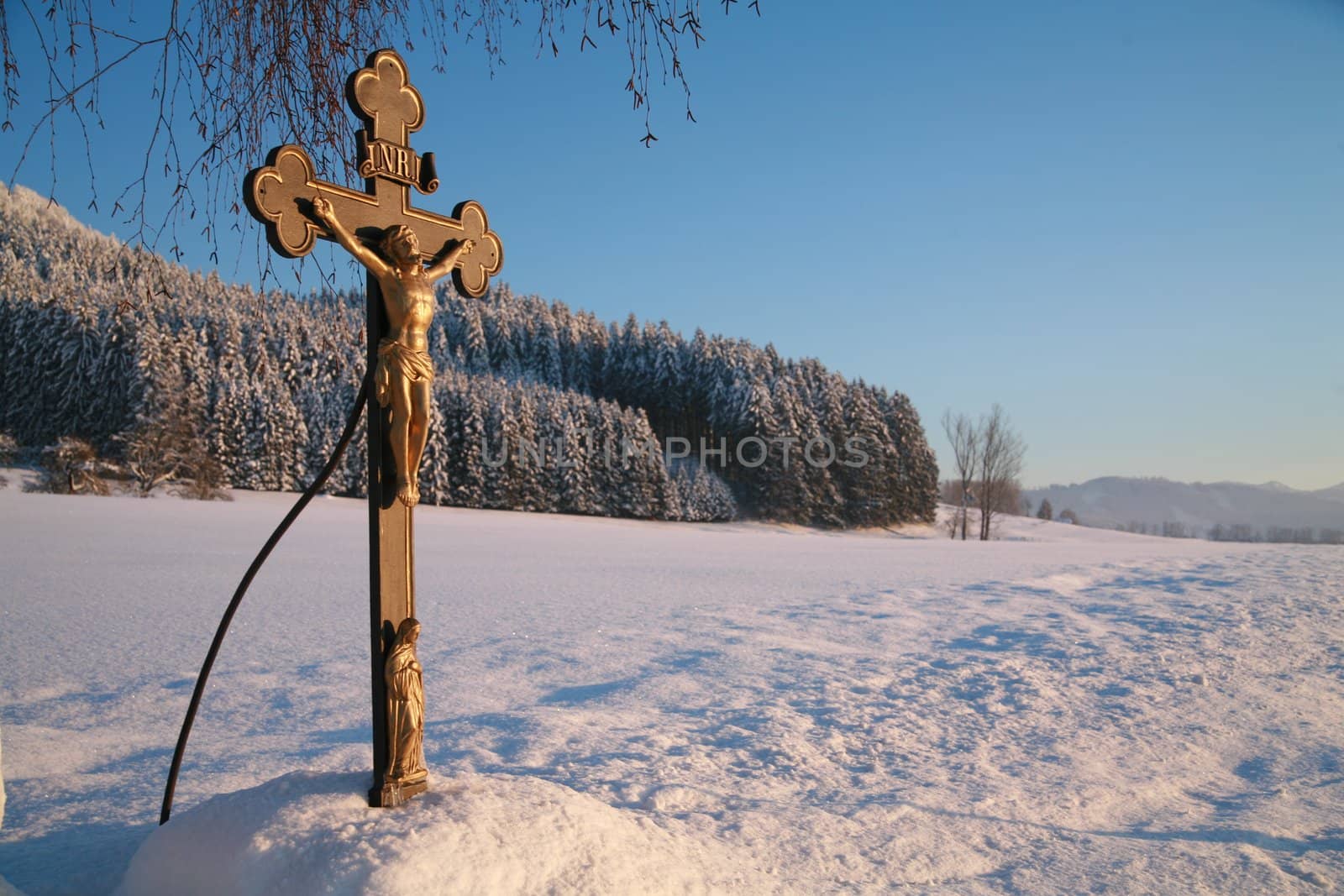 Cross in winterscene