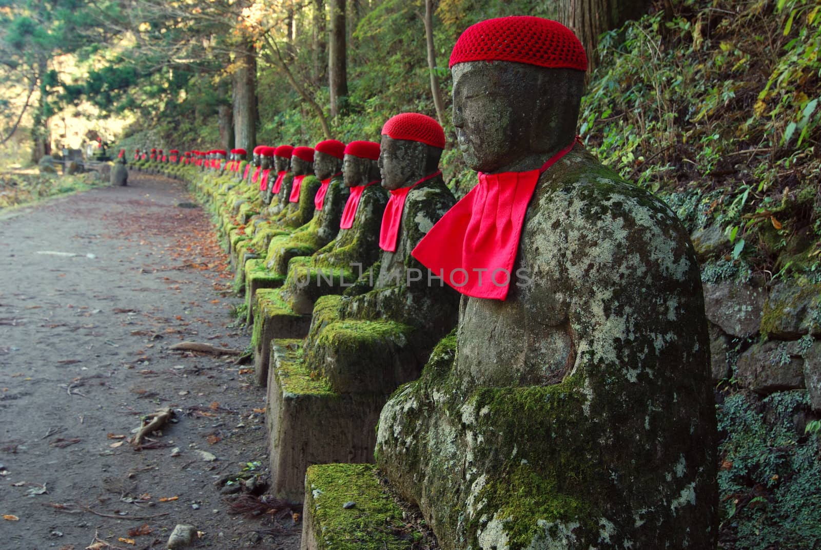 row of Japanese Jizo in Nikko, Japan; this is very famous historical place called Narabi-jizo and Bake-jizo