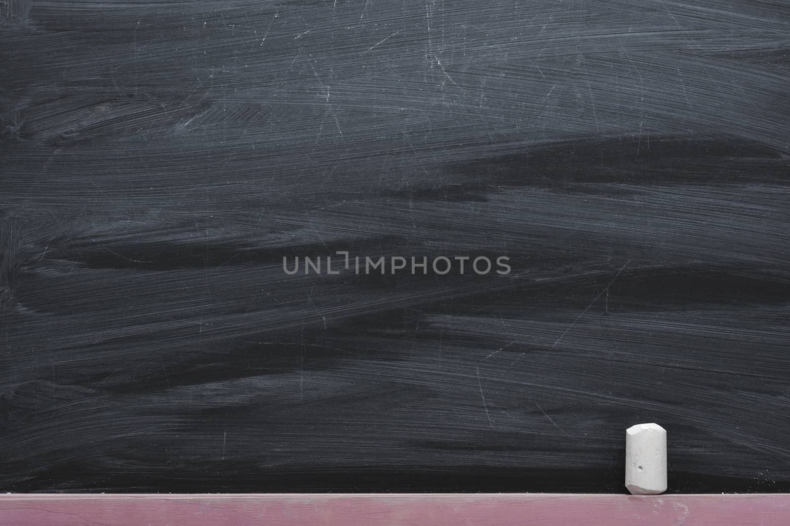 hi-res black chalkboard fragment with white chalk piece
