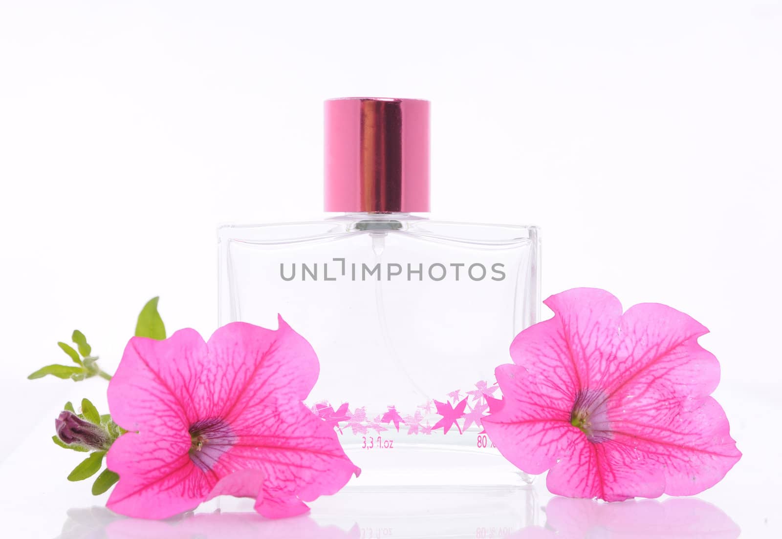 women's perfume in beautiful bottle and flower