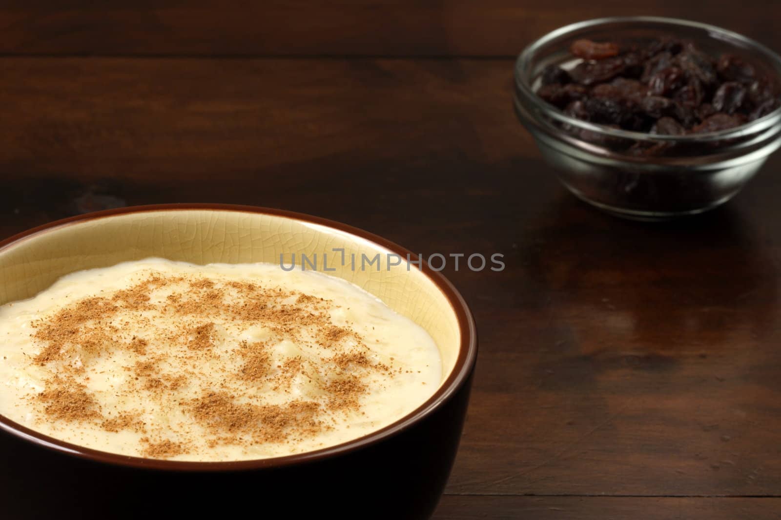 delicious rice pudding  with  cinamon and raisins one of the most delicious desserts ever 