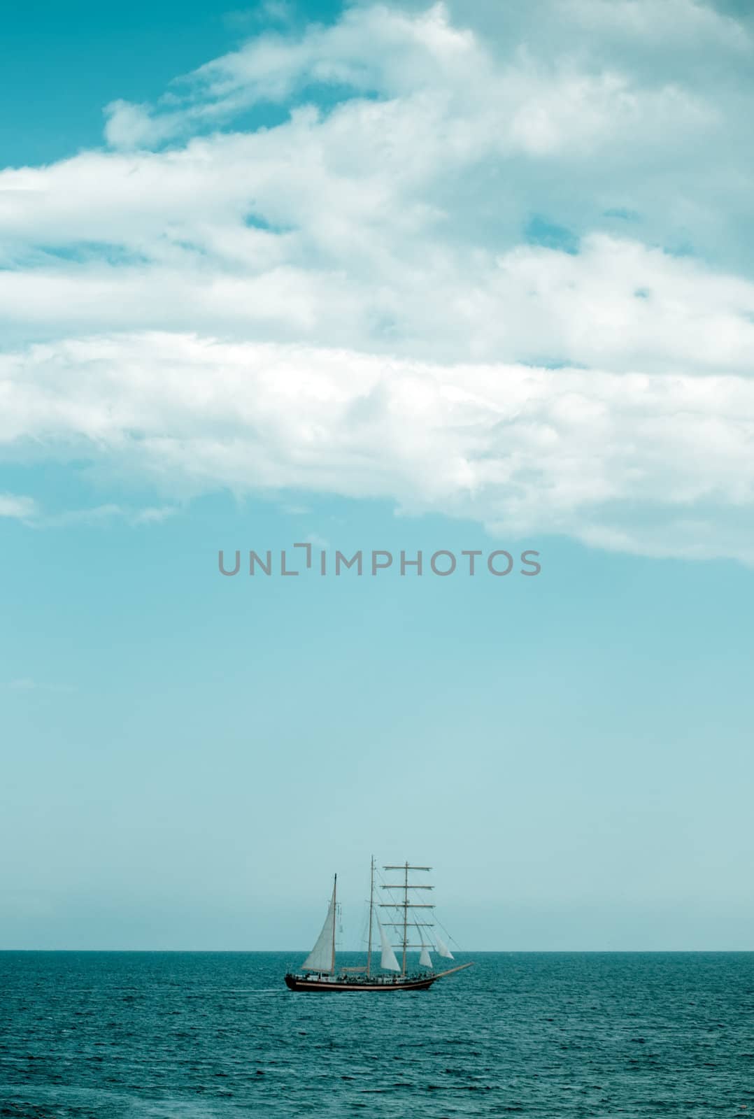 Image of vintage style. Old sailing ship in the sea .