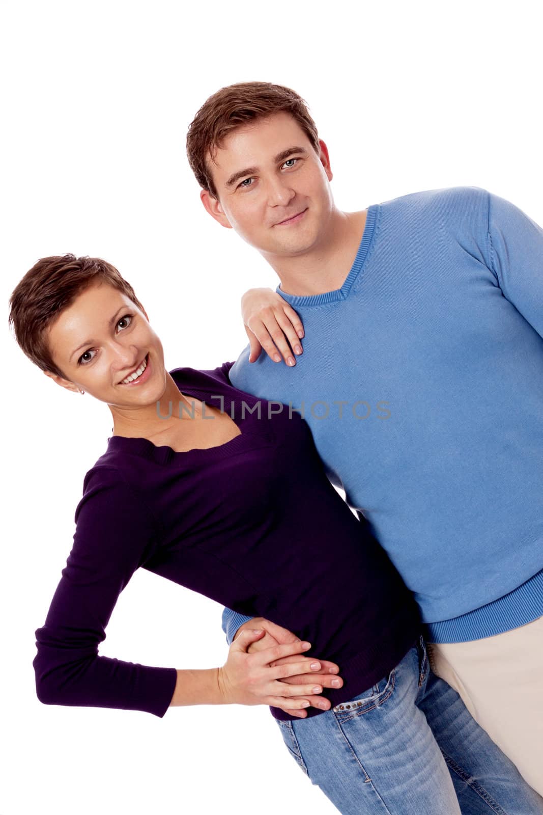 young happy couple smiling in love isolated on white background