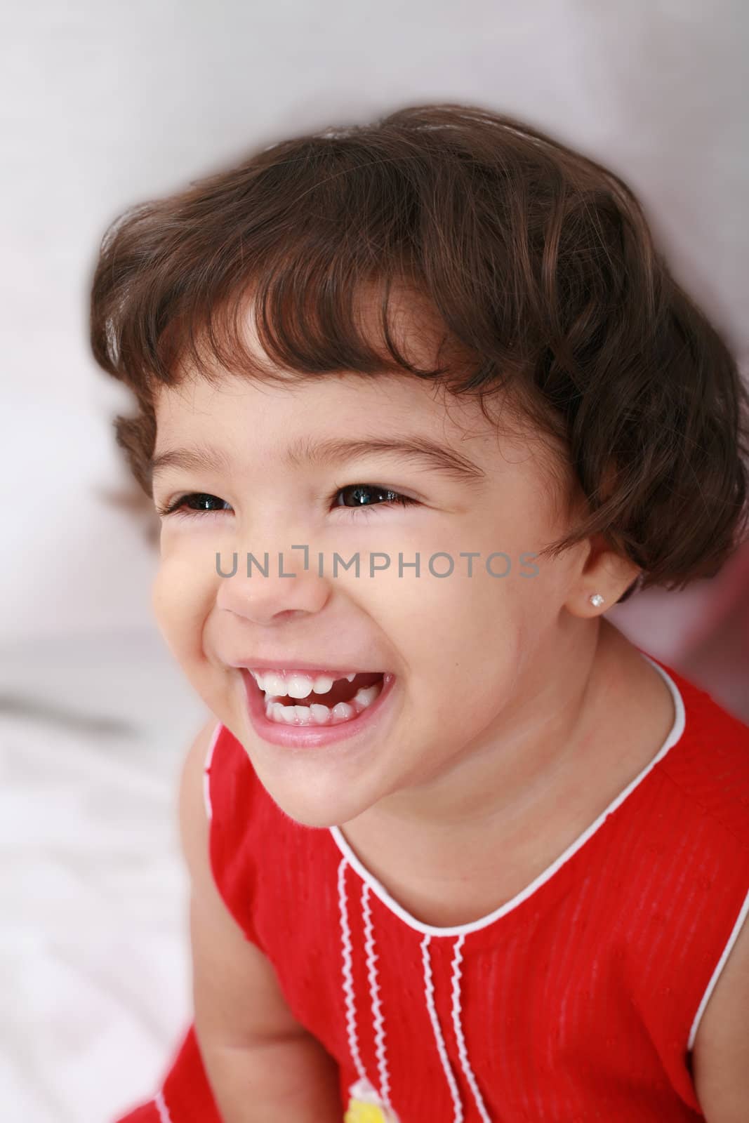 beautiful little girl isolated on a white background