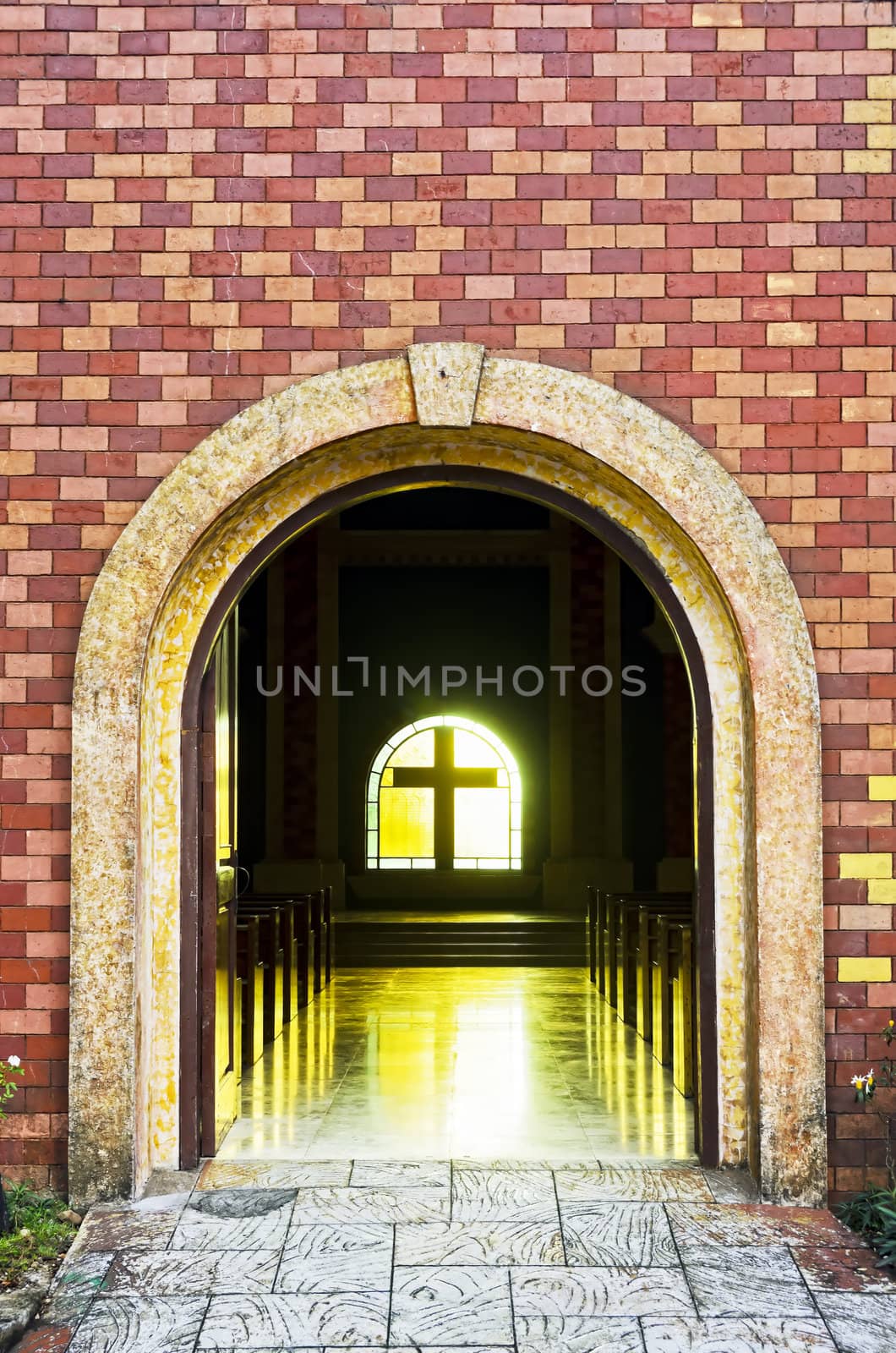 Heavy arch entrace of an ecumenical church