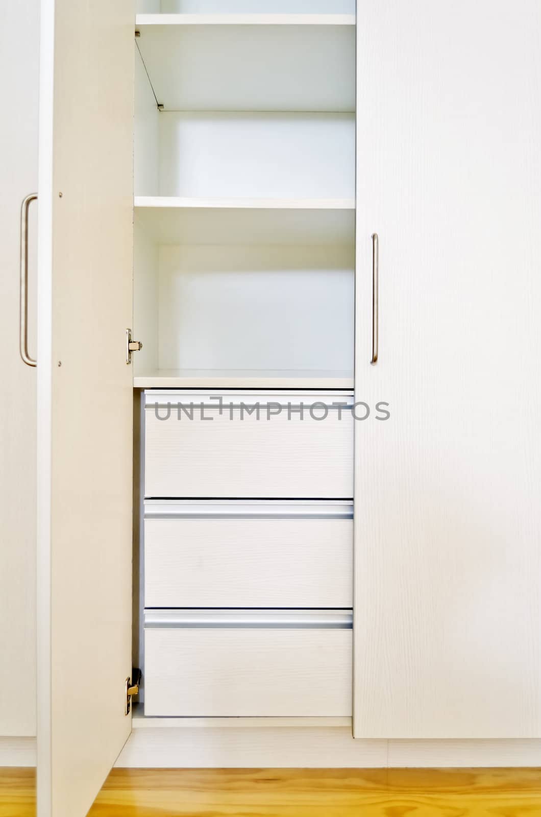 Built-in cabinet in room of an unoccupied newly-built apartment.