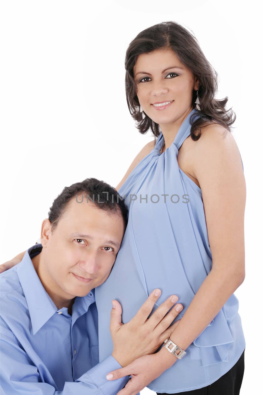 Portrait of a happy young pregnant woman with her husband by dacasdo