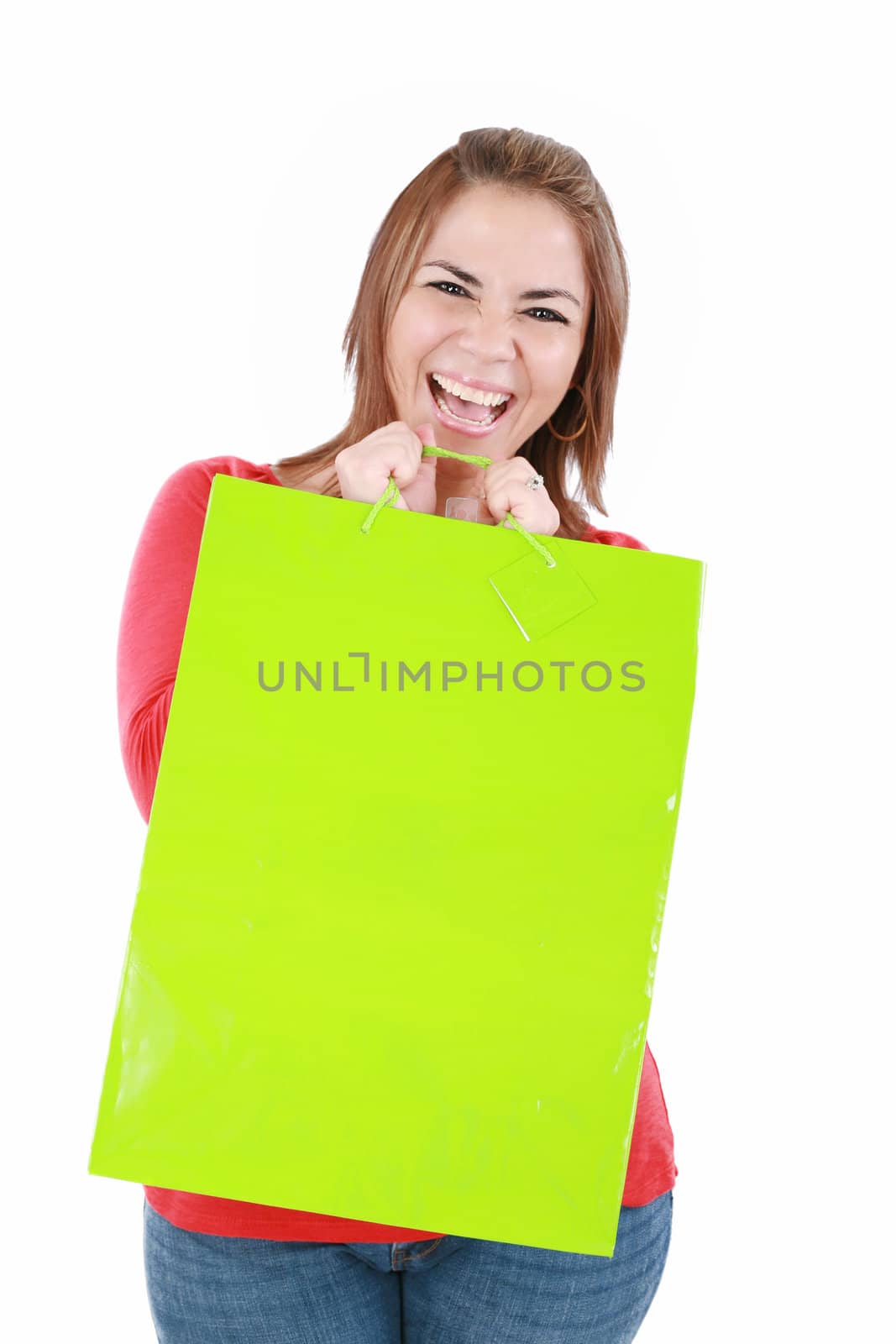 lovely woman happy with shopping bag over white by dacasdo
