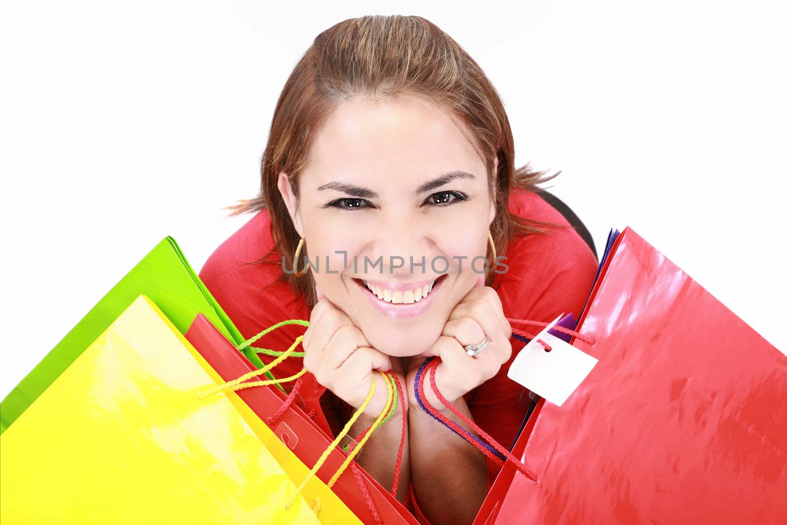 Beautiful shopping woman happy holding shopping bags. by dacasdo