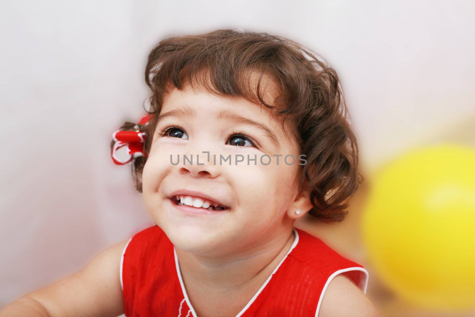 Two years old girl expressing happy over white background