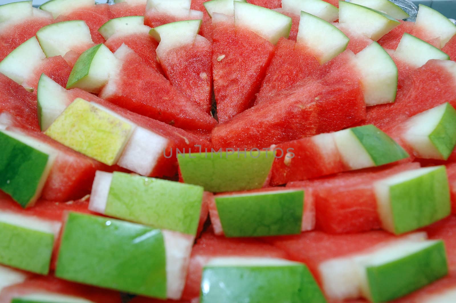 stack of slices of watermelon by antonihalim