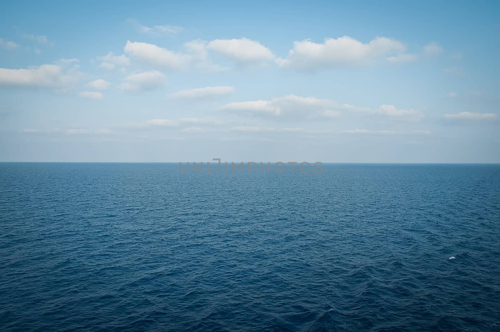Beautiful blue  sky and  blue sea  .