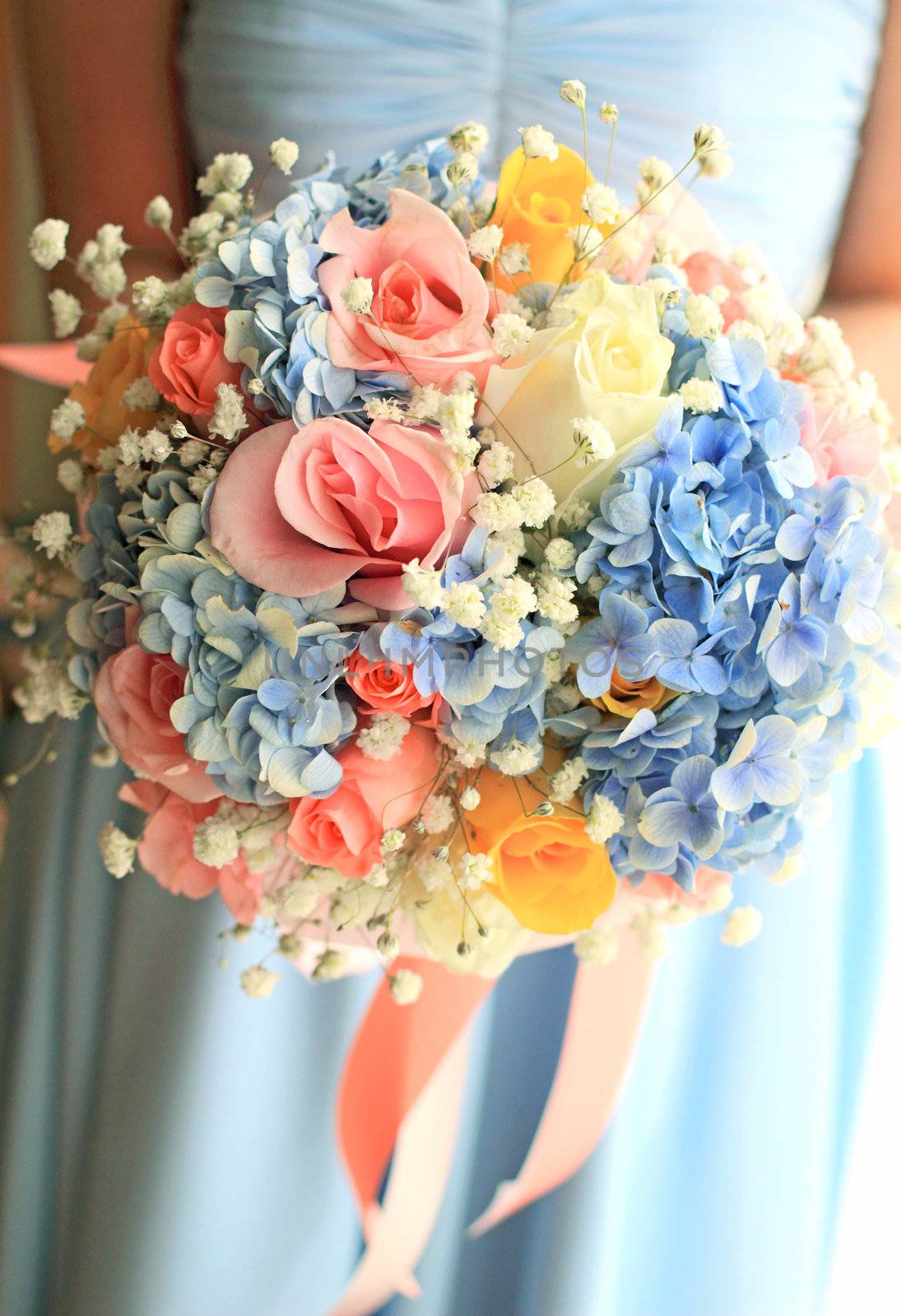 Bride or bridemaid with bouquet, closeup 