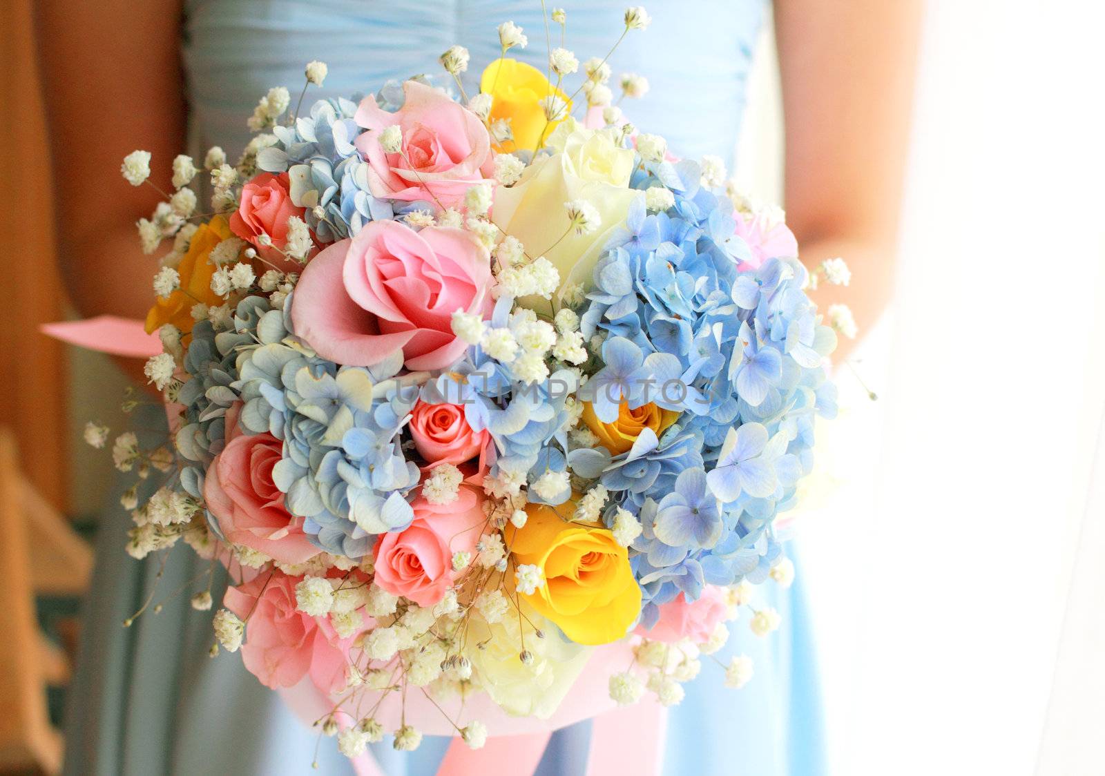 Bride or bridemaid with bouquet, closeup  by nuchylee