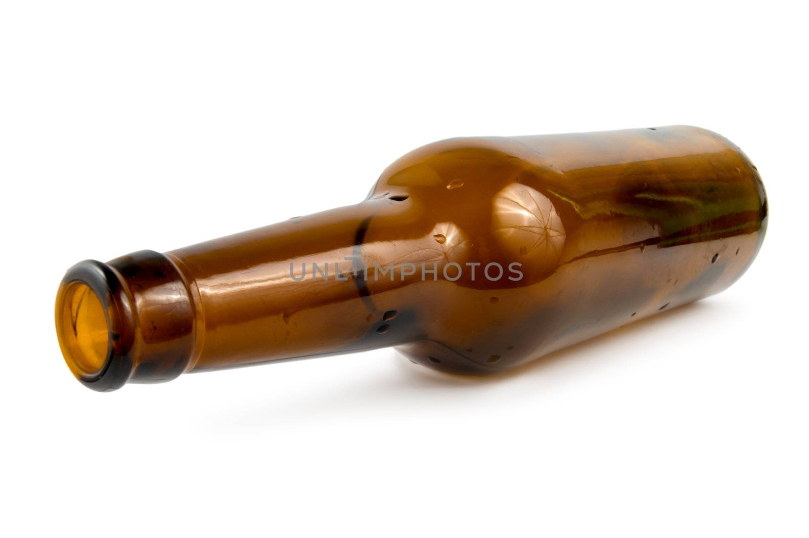 A beer bottle covered with water drops isolated on white