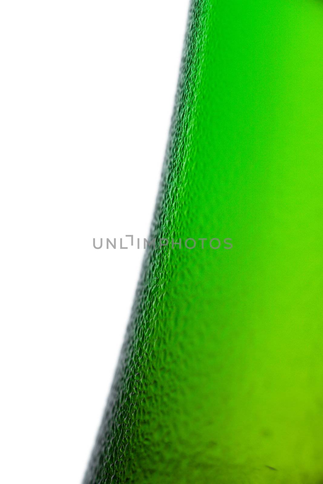 Macro view of dew on a cold green bottle