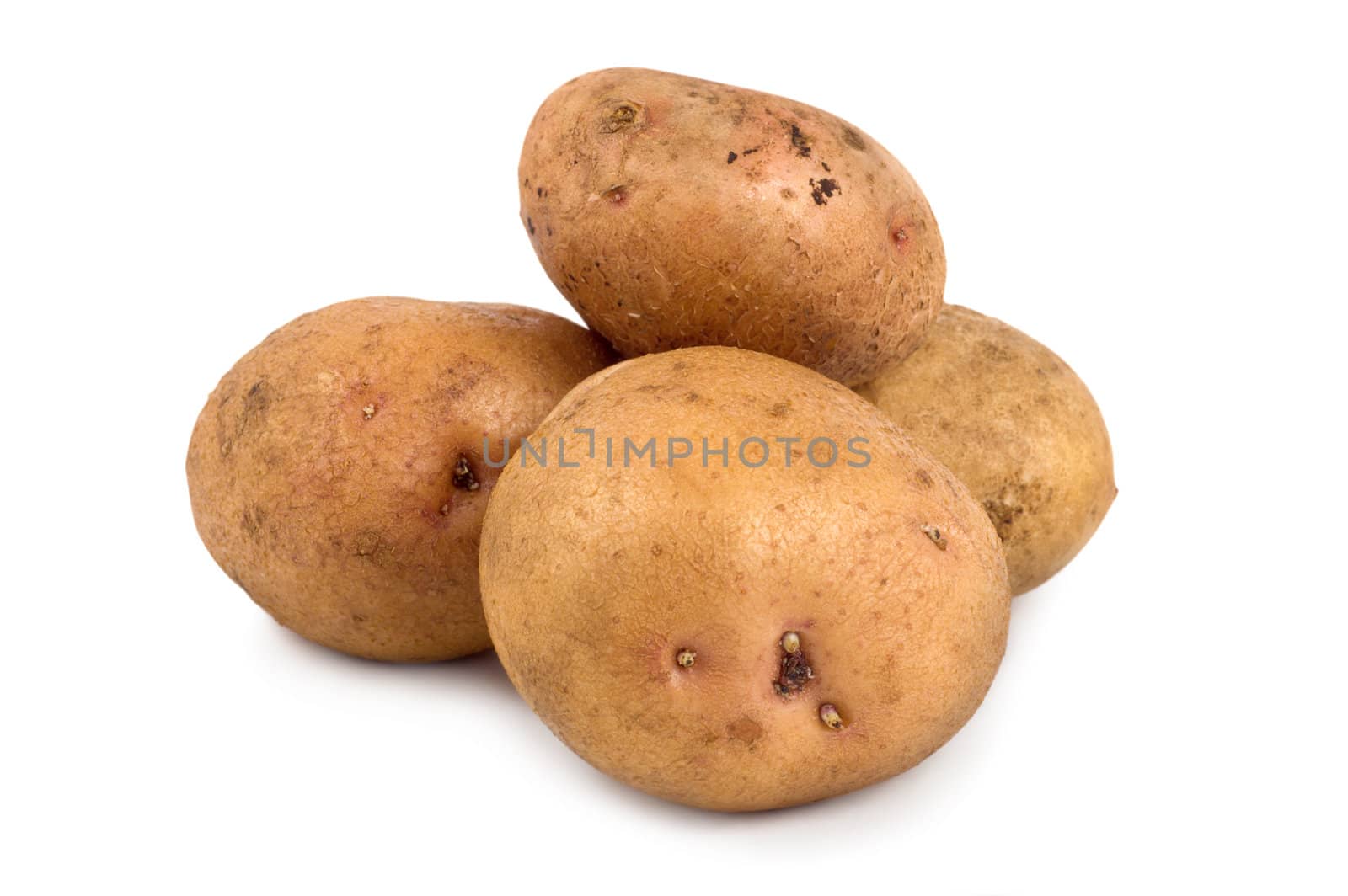 Three potatoes isolated on a white by Givaga