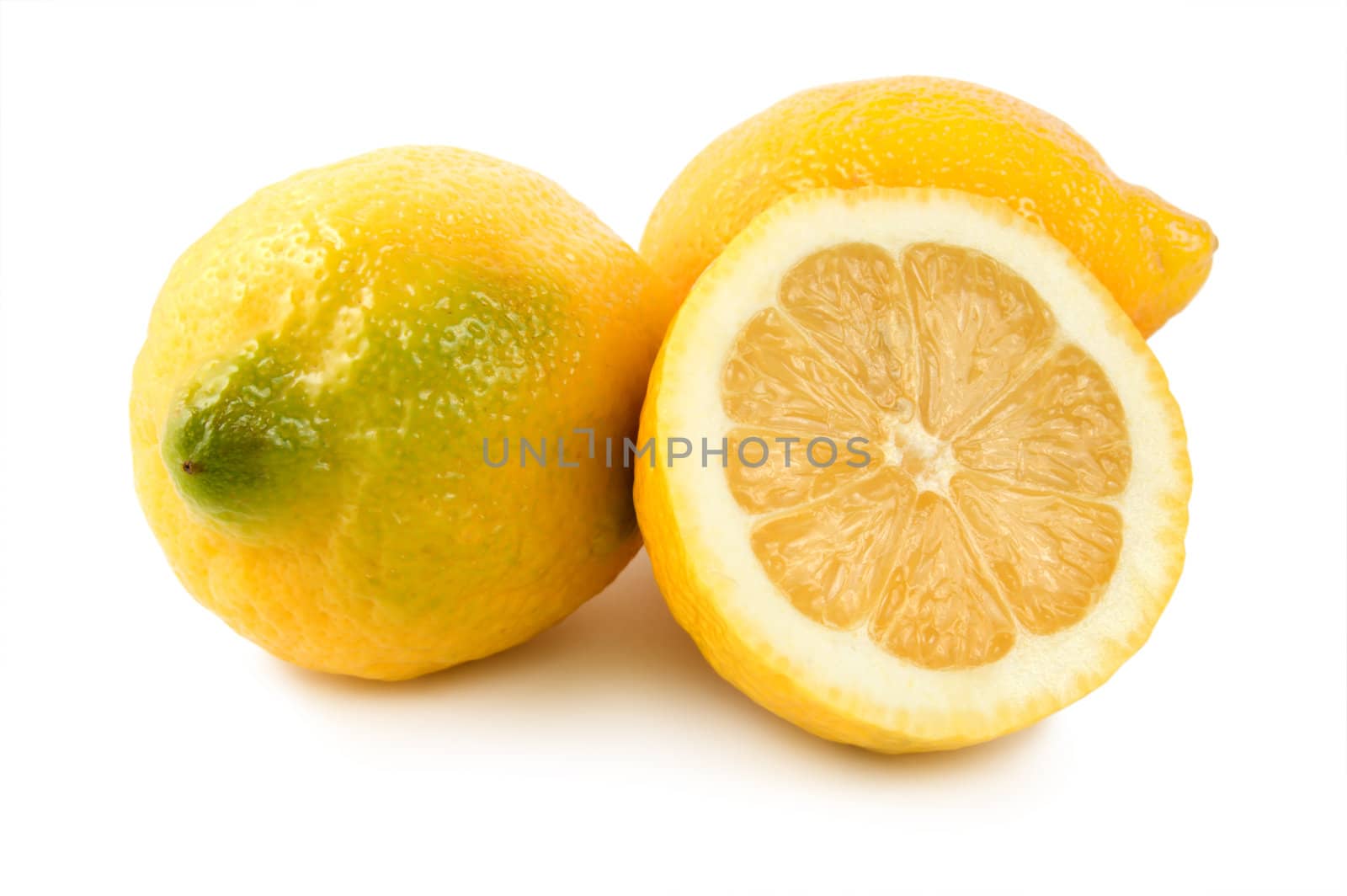 Three lemons isolated on a white background