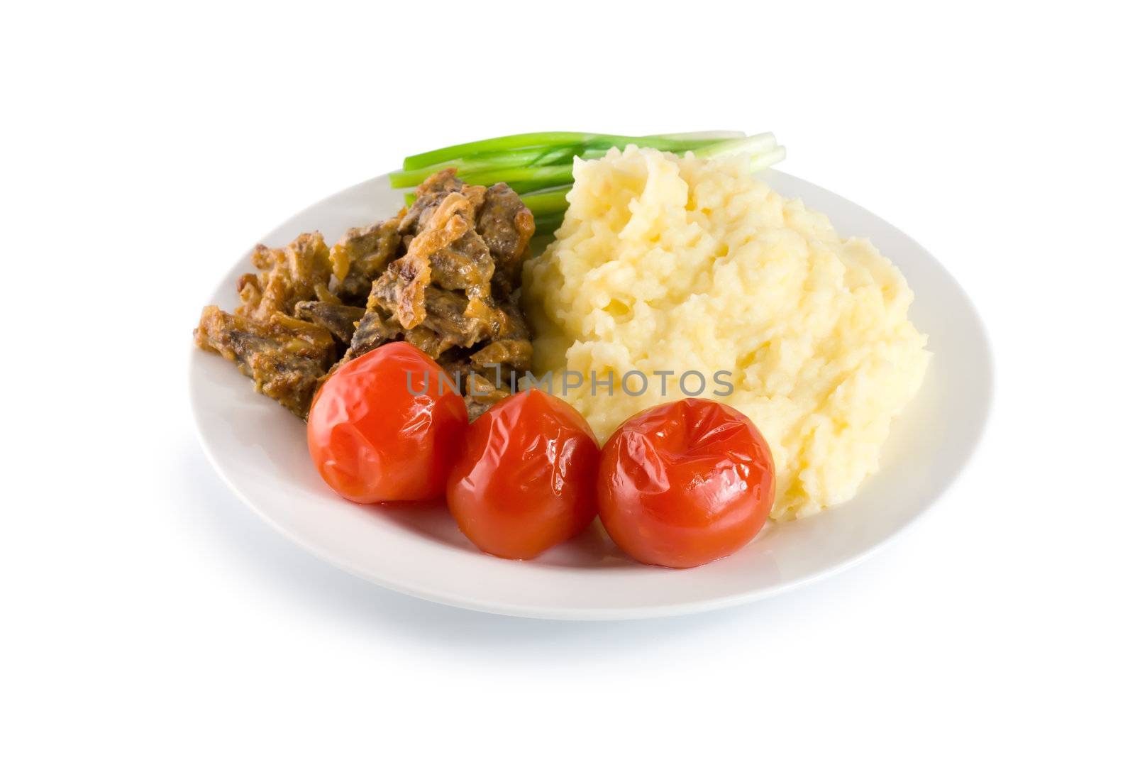 Cooked potatoes with liver and vegetables on the table (Path)