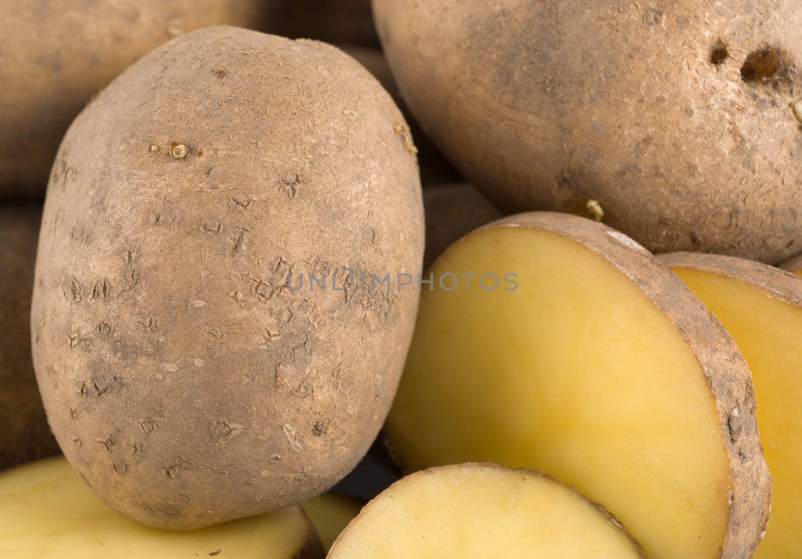 A large group of objects raw potatoes