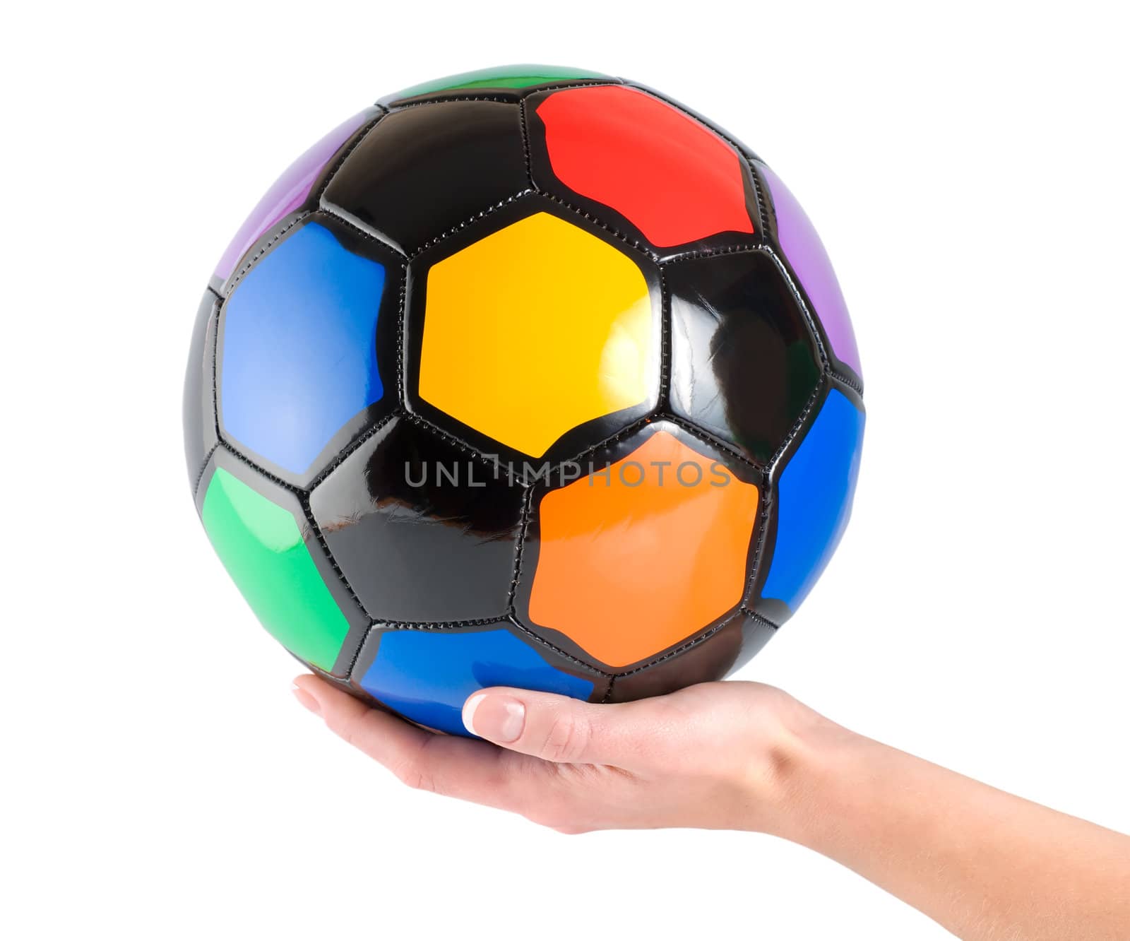 Soccer ball in hand isolated on white background