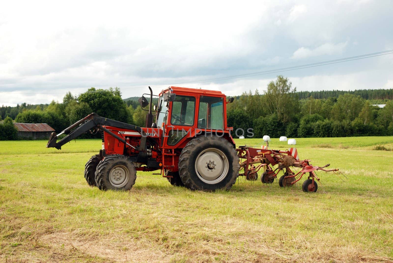 A red agricultural machinery