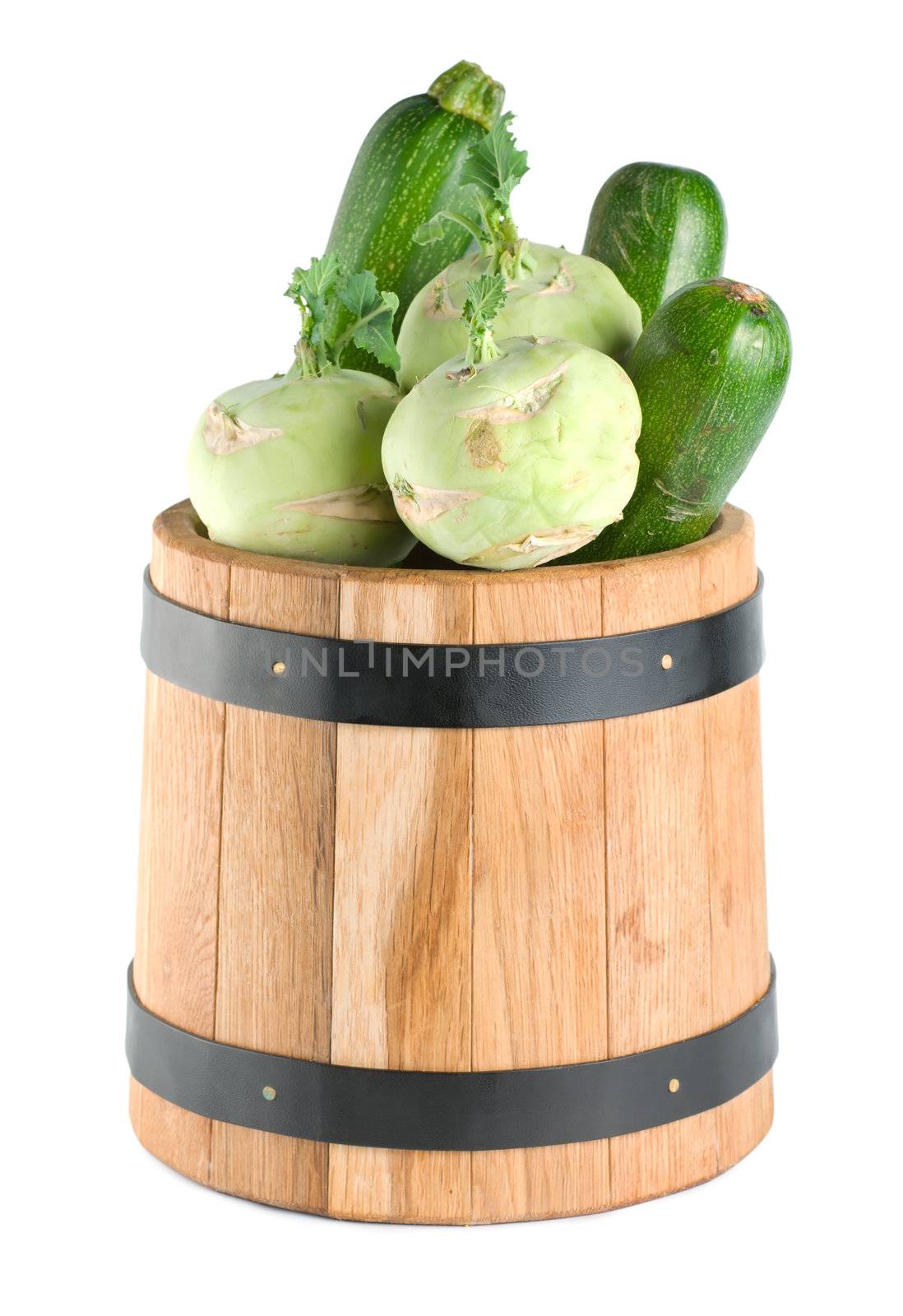 Vegetables in a wooden barrel by Givaga