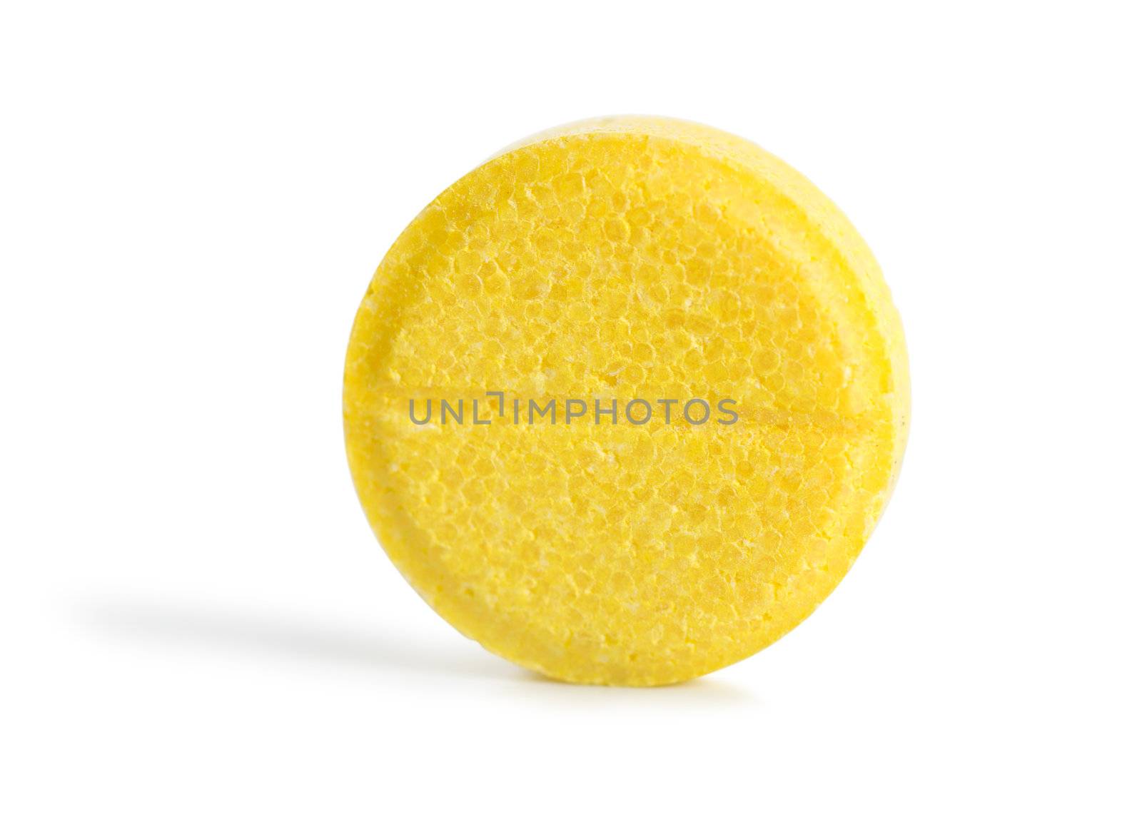 Vitamin pill isolated on a white background