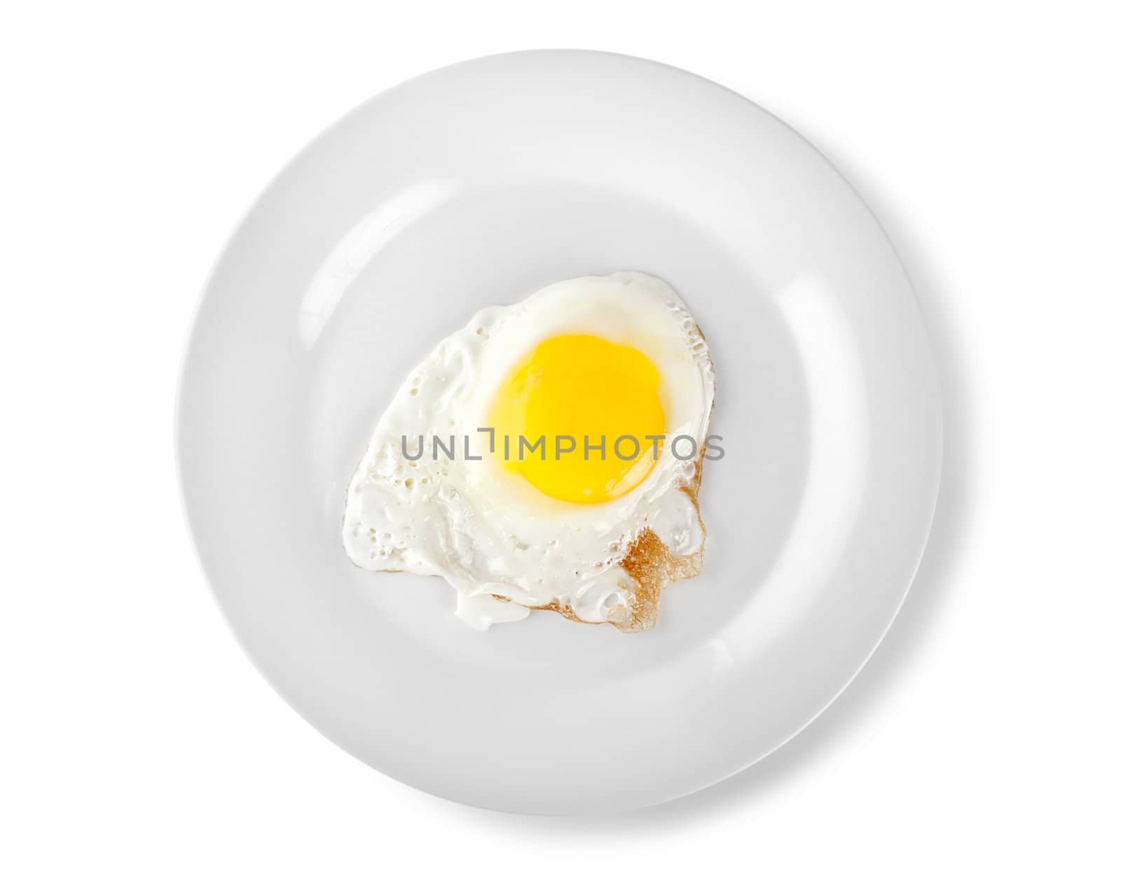 Fried egg on a plate isolated on white background (Path)