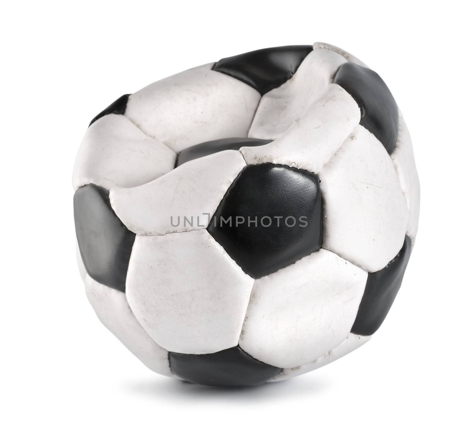Deflated soccer ball isolated by Givaga