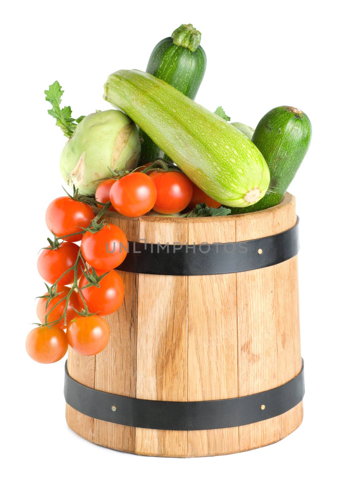 Wooden barrel with vegetables isolated by Givaga