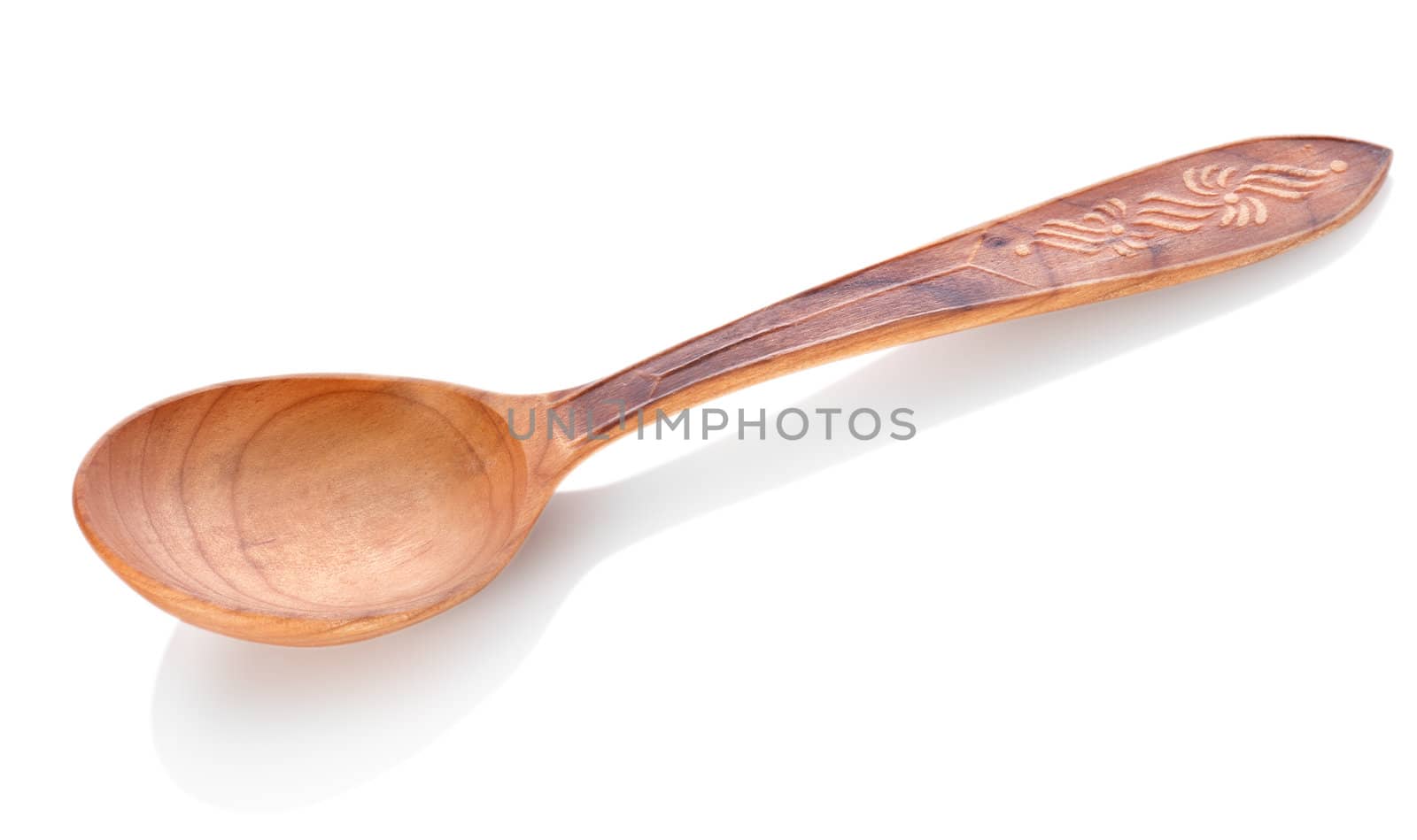 Wooden spoon isolated on a white background