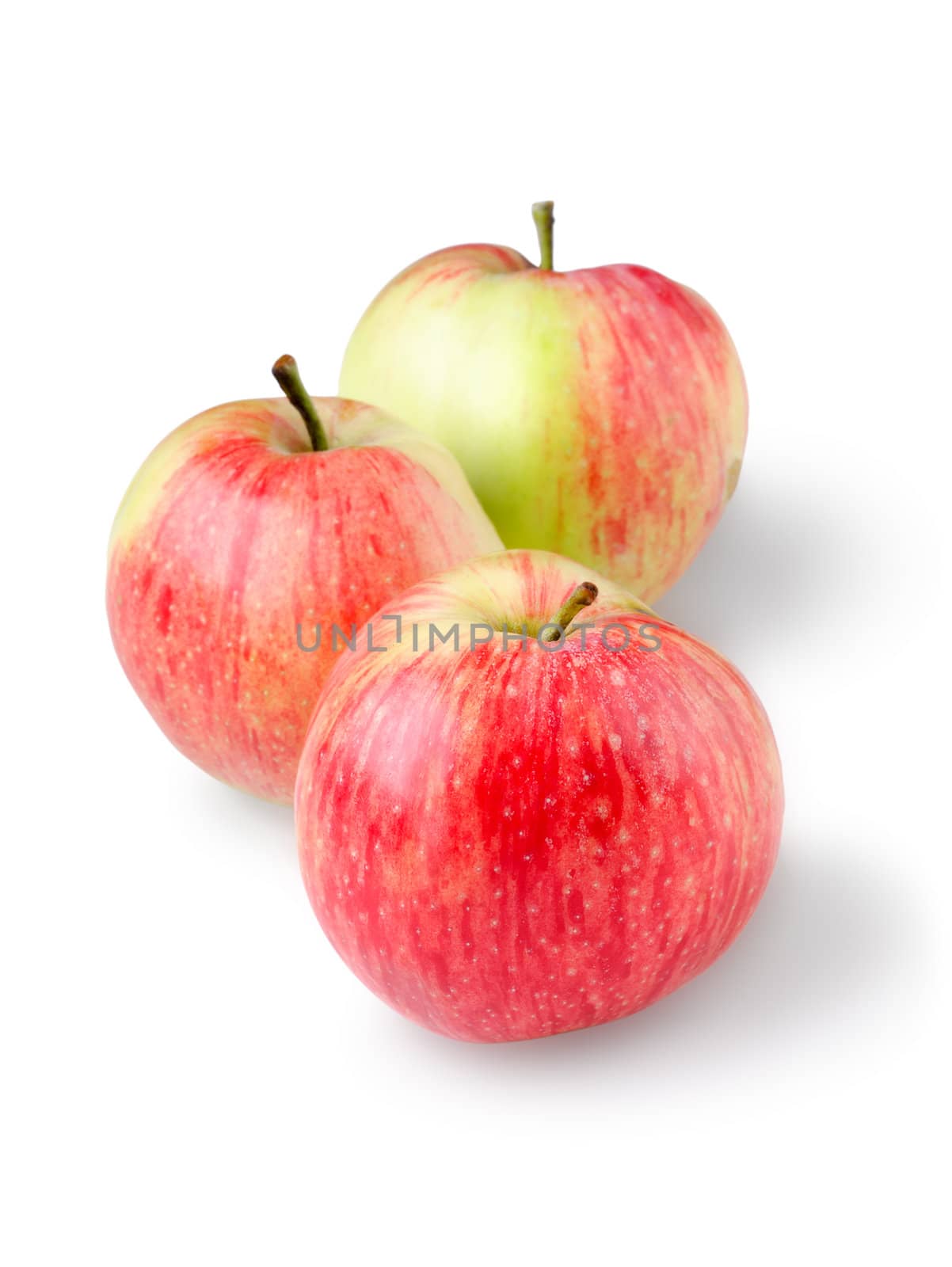 Three ripe apples isolated on a white background