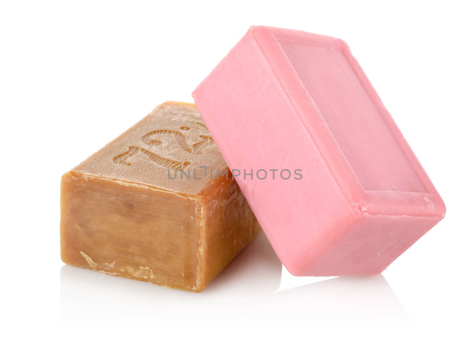 Two pieces of soap isolated on a white background