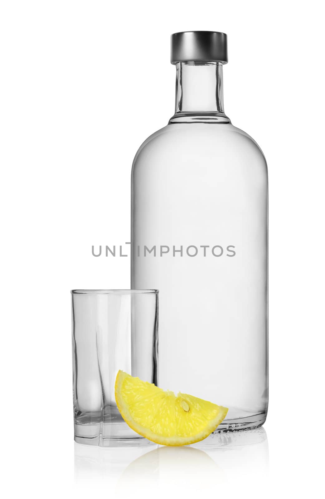 Bottle of vodka and lemon isolated on a white background