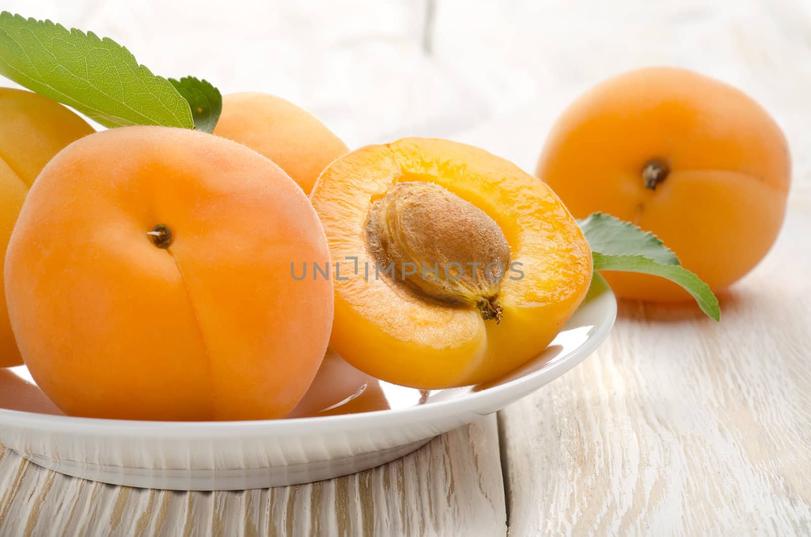 Apricot on the table by Givaga